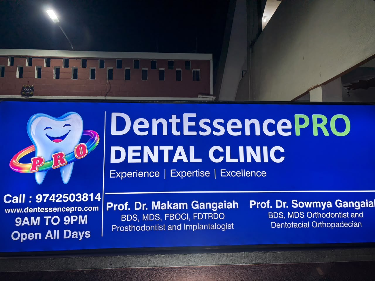 DentEssencePro Dental Clinic signboard showing the mentors and their credentials